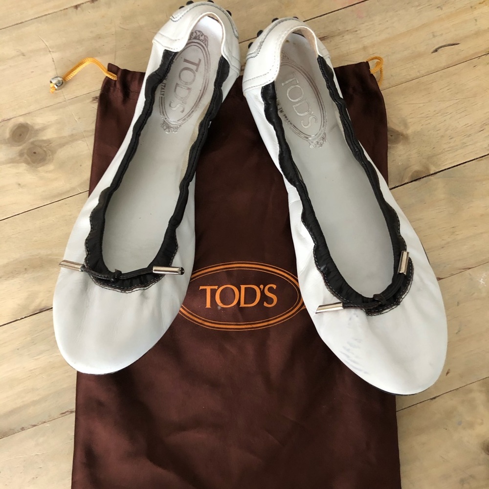Tod’s white ballerina style driving shoes.